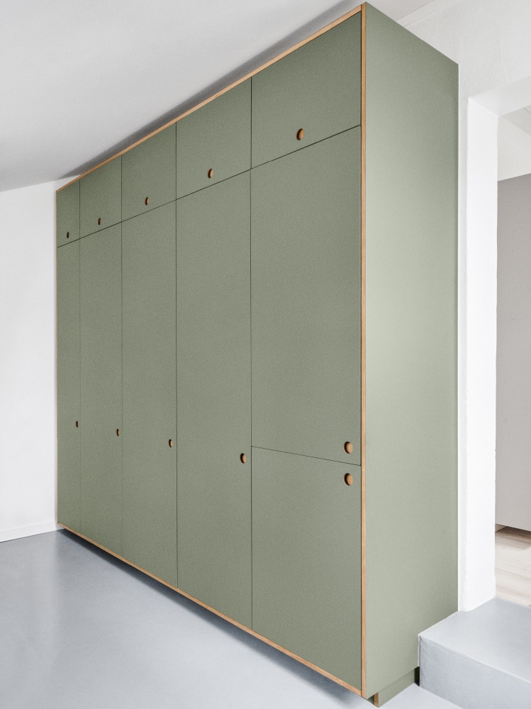 White kitchen and green wardrobe with BASIS fronts