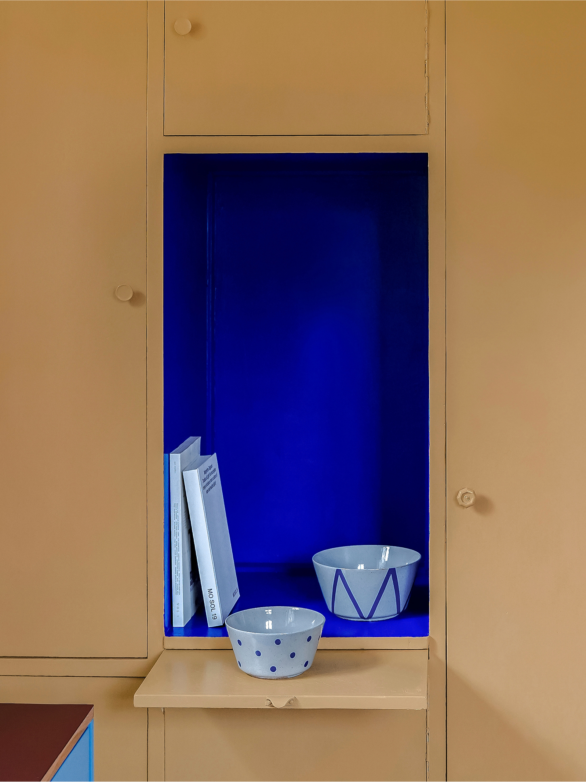 Blue and yellow BASIS kitchen