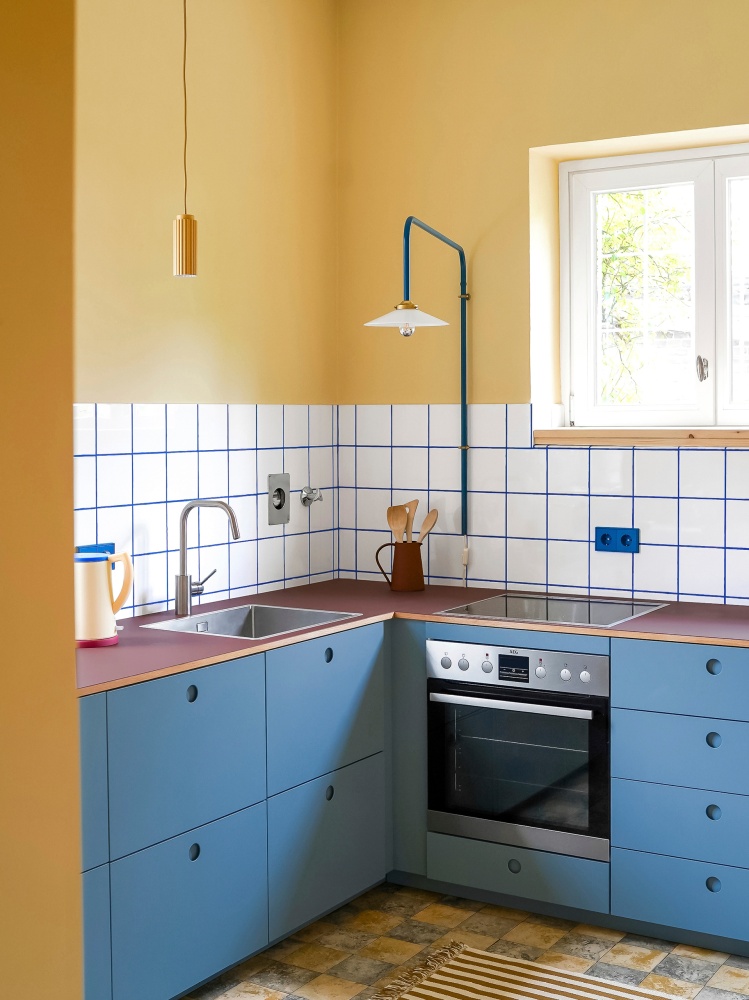 Blue and yellow BASIS kitchen