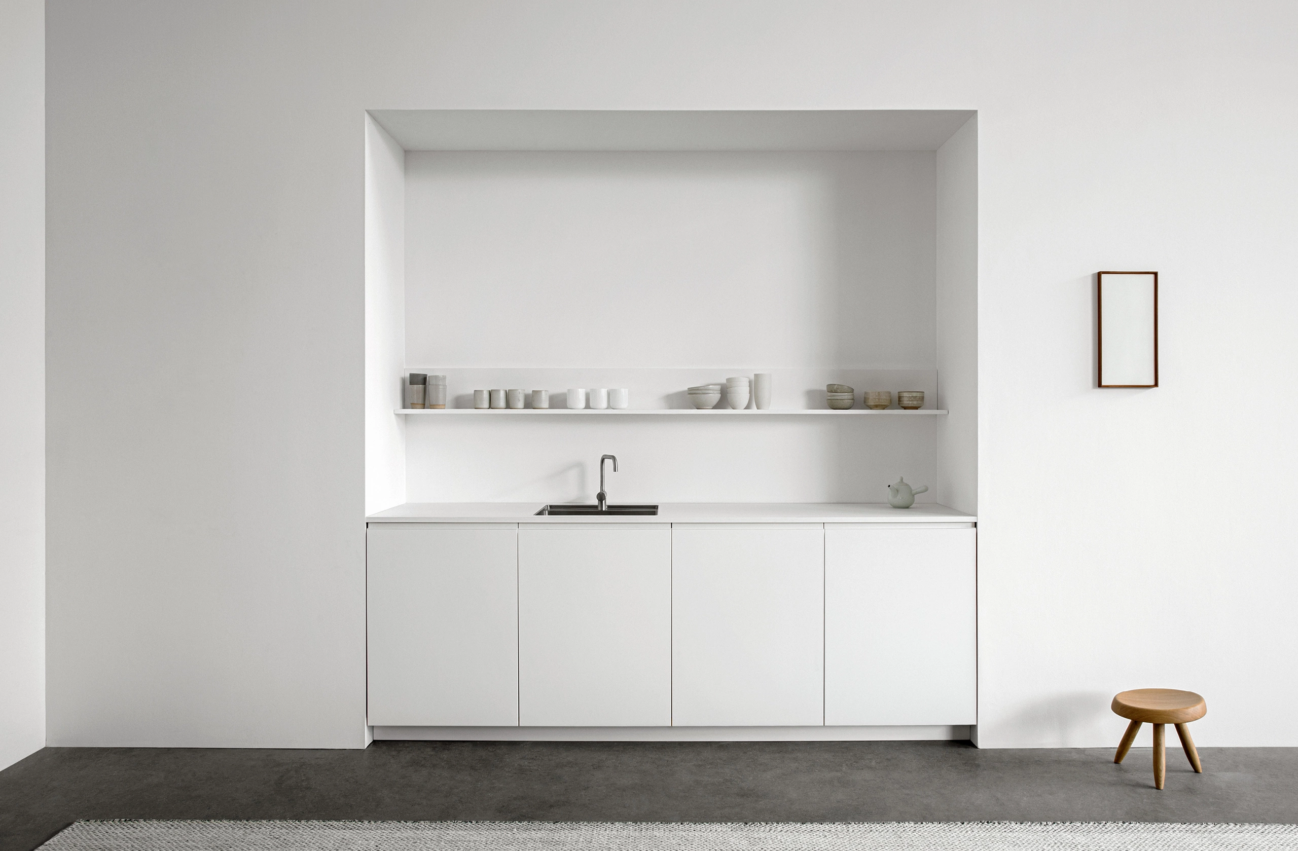 Reform Profile open shelving: warm wood floating shelves against white cabinetry