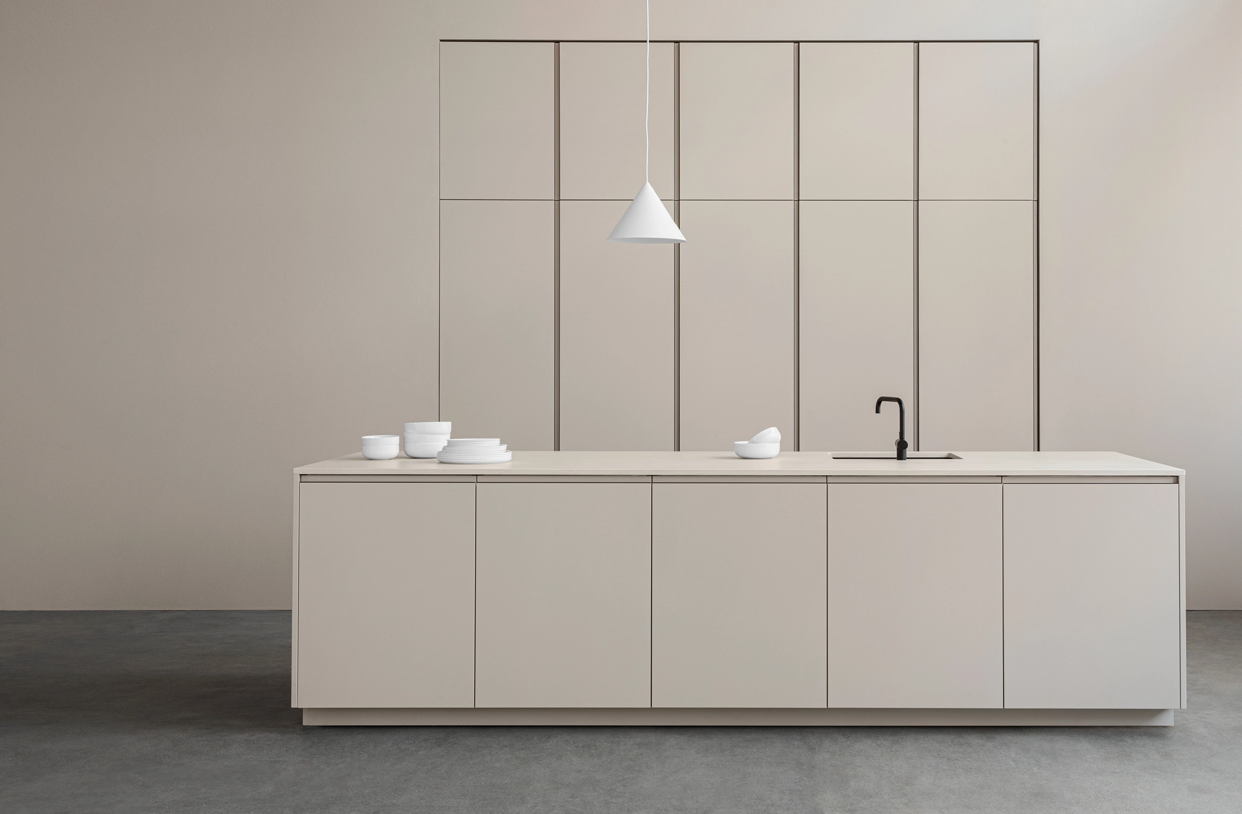 Reform Profile kitchen: white matte handleless cabinets with slim aluminium J-pull