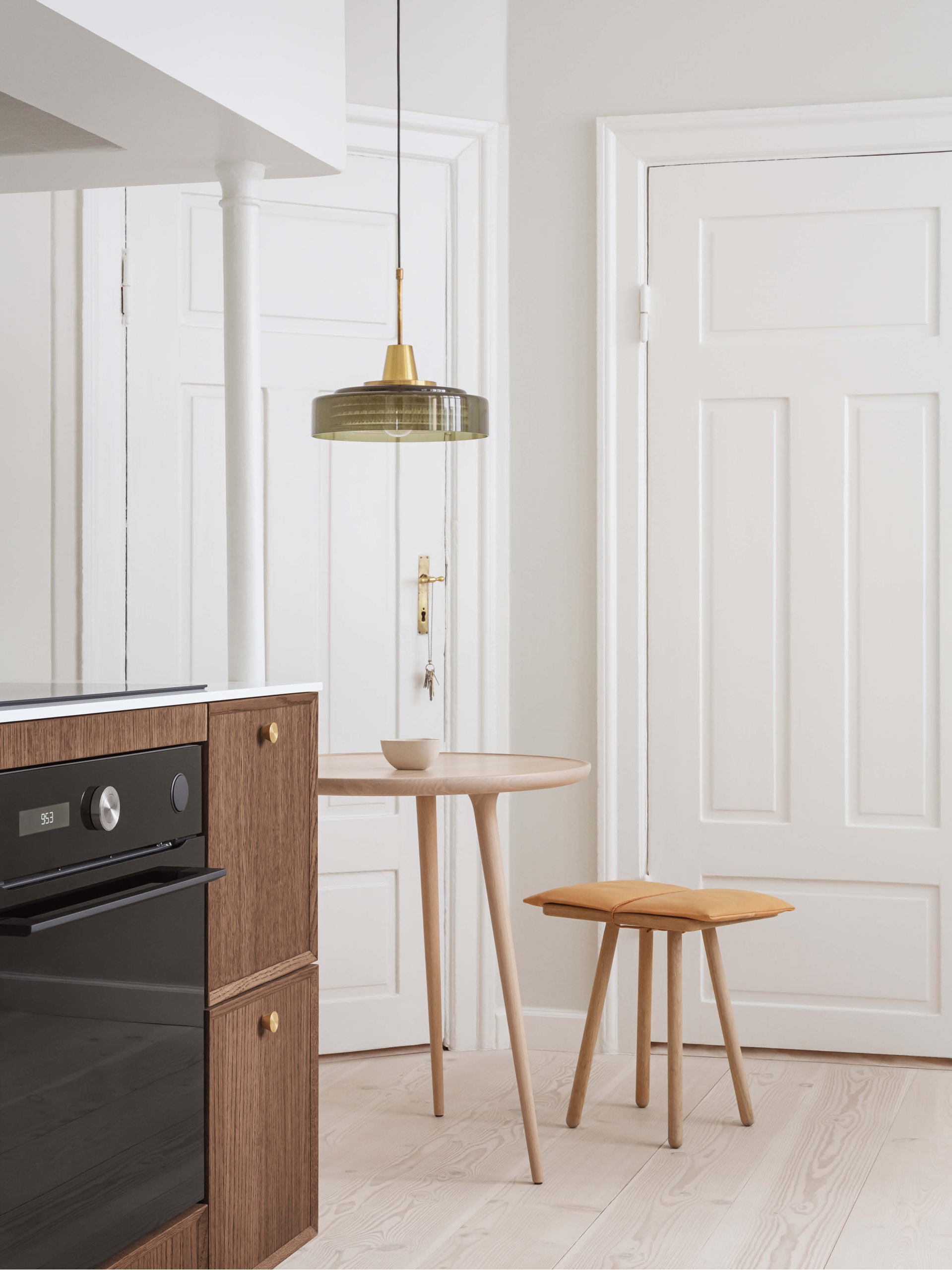 FRAME Dark Oak kitchen cabinets with brass knobs