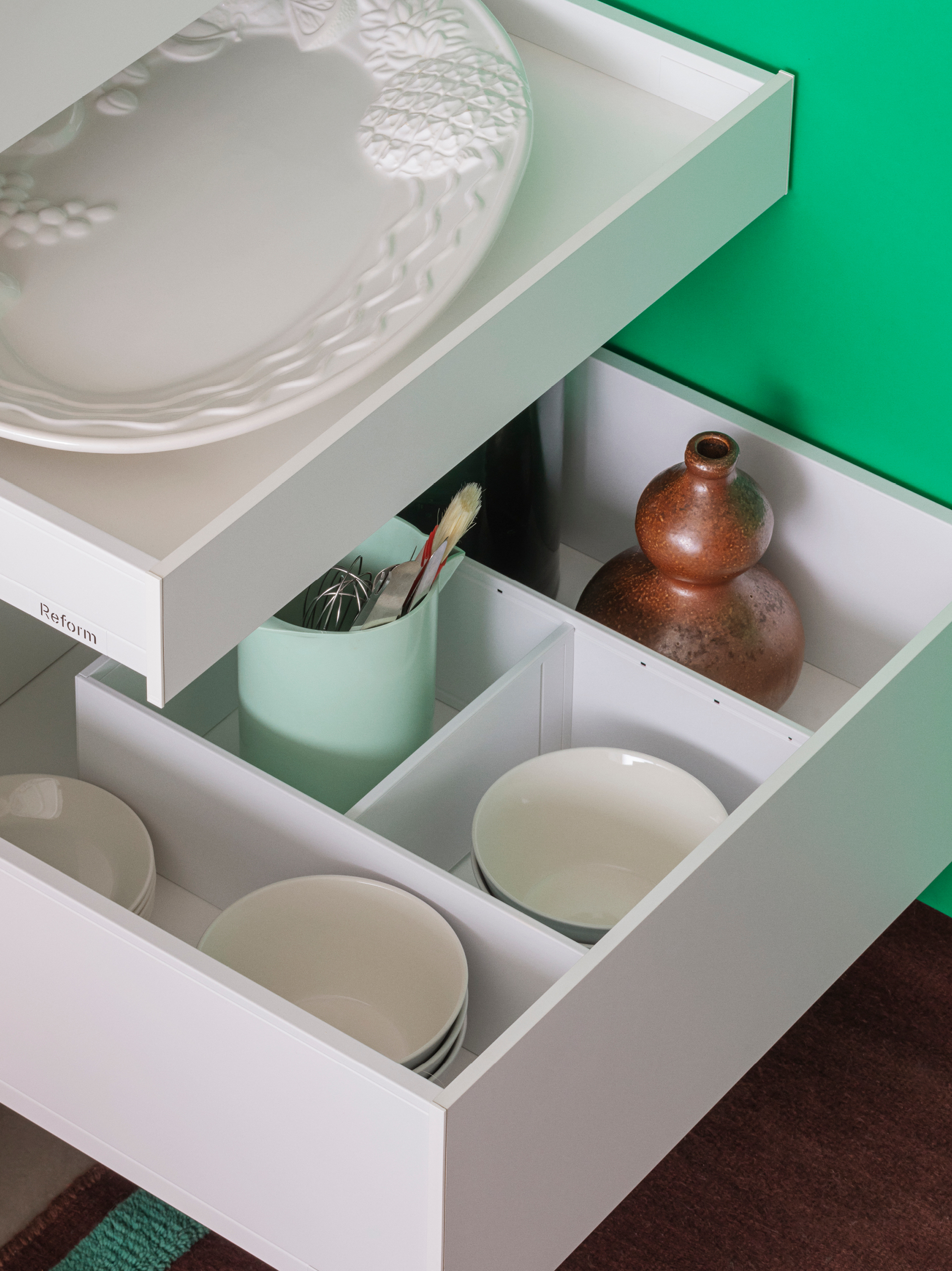 Kitchen cabinets with wooden drawers
