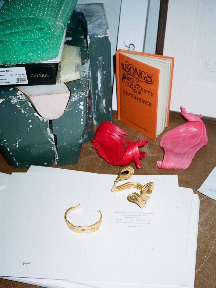 Gold jewelry on table