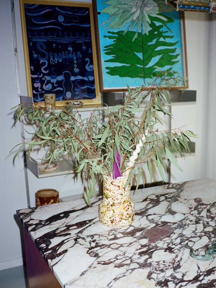 Vase with green branches